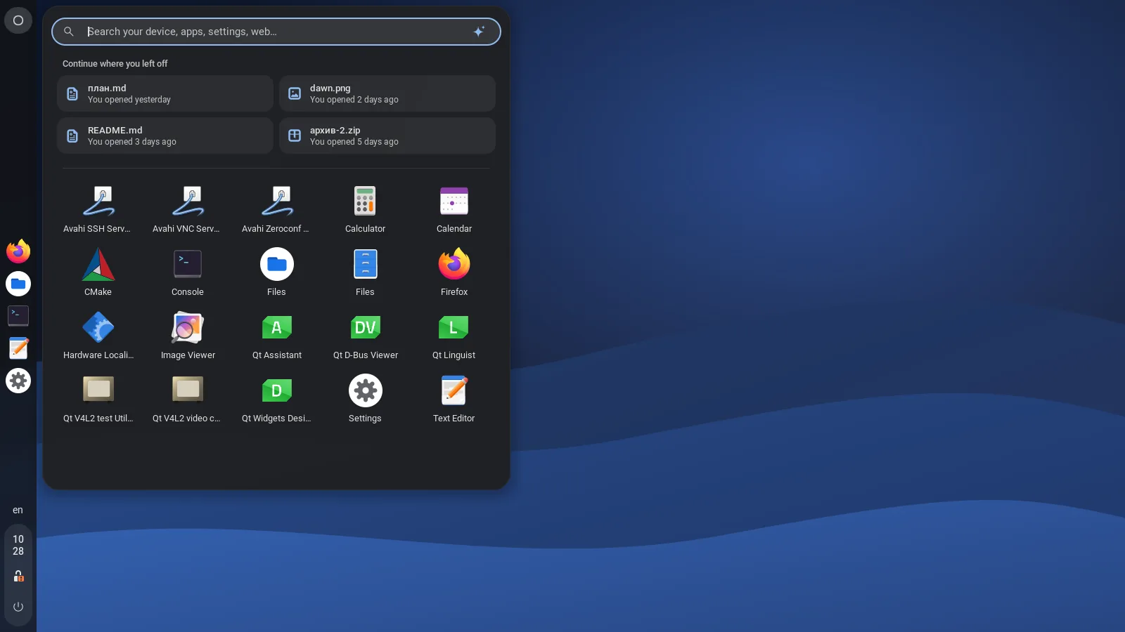 Dark theme: the shelf on the left edge with the launcher open next to it